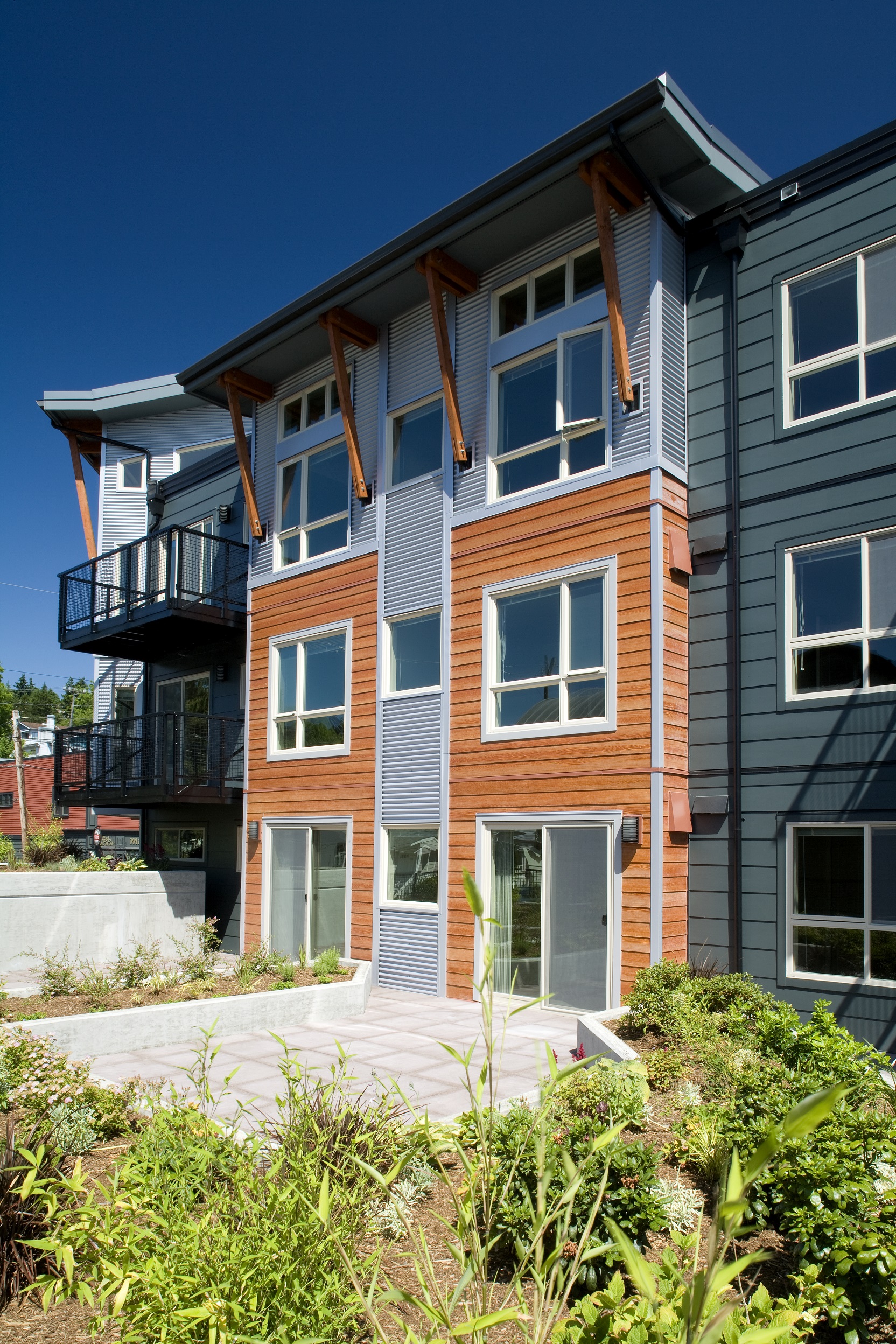 Back patios at Tempo Apartments